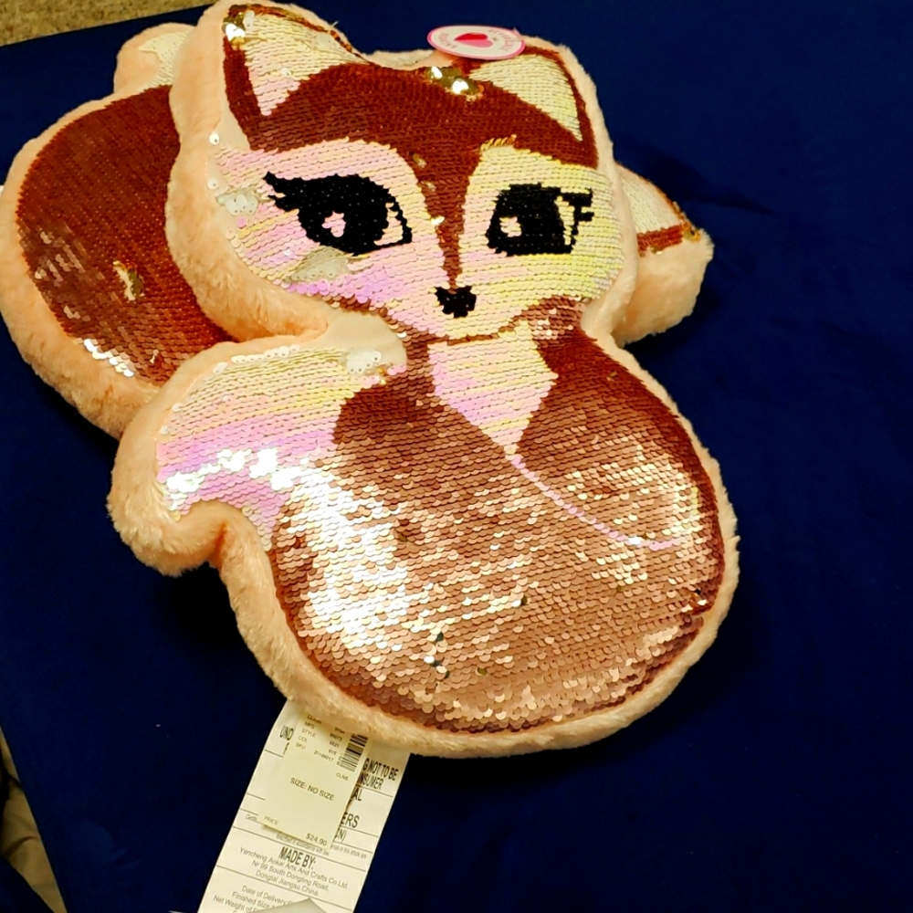 Adorable Justice flippy sequence pillow.  Perfect for sleep overs or parties.